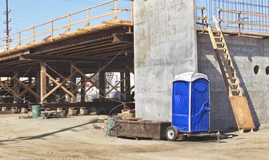 easily accessible portable restrooms at a work site, saving workers from long walks to a permanent restroom